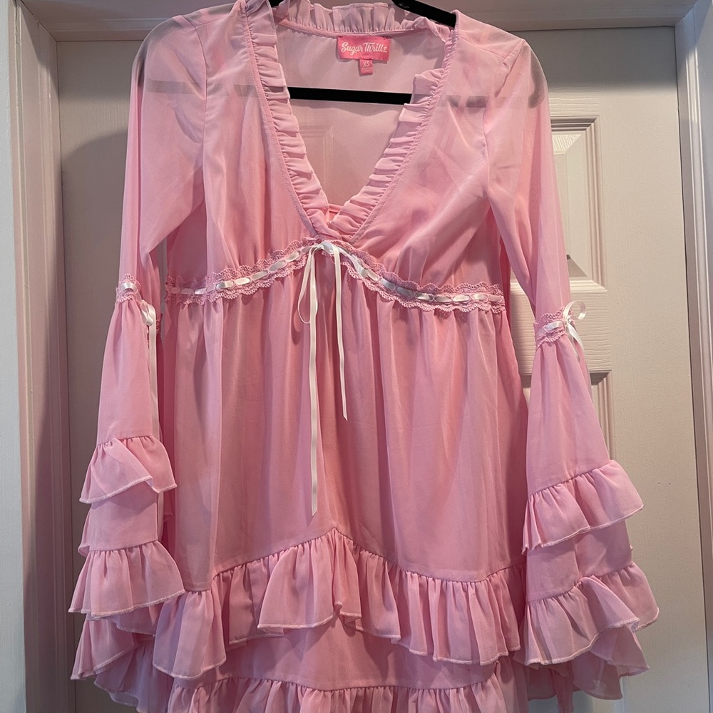 Sheer Pink Ruffle mini dress by Sugar Thrillz